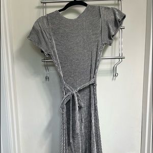 SMALL Black and white striped midi dress. Features a faux wrap neckline.